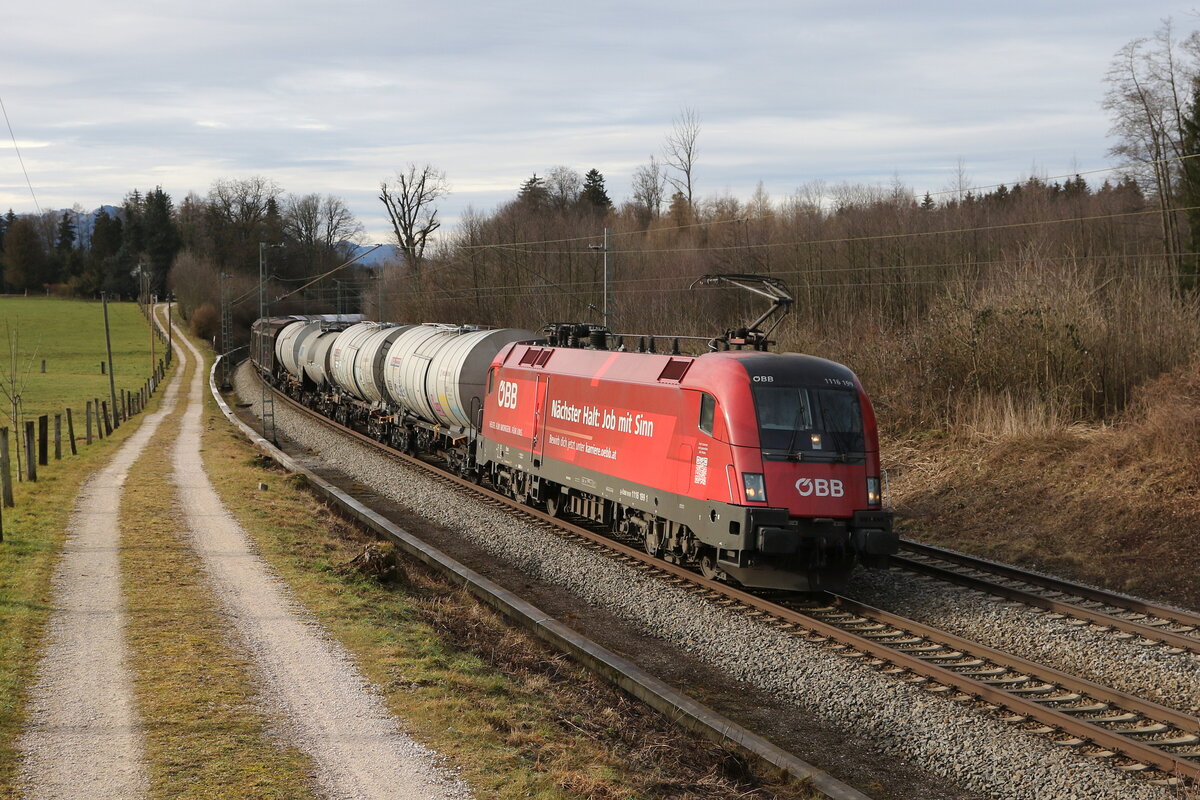 1116 199  Nchster halt: Job mit Sinn  mit einem gemischten Gterzug am 4. Januar 2023 bei Sossau im Chiemgau.