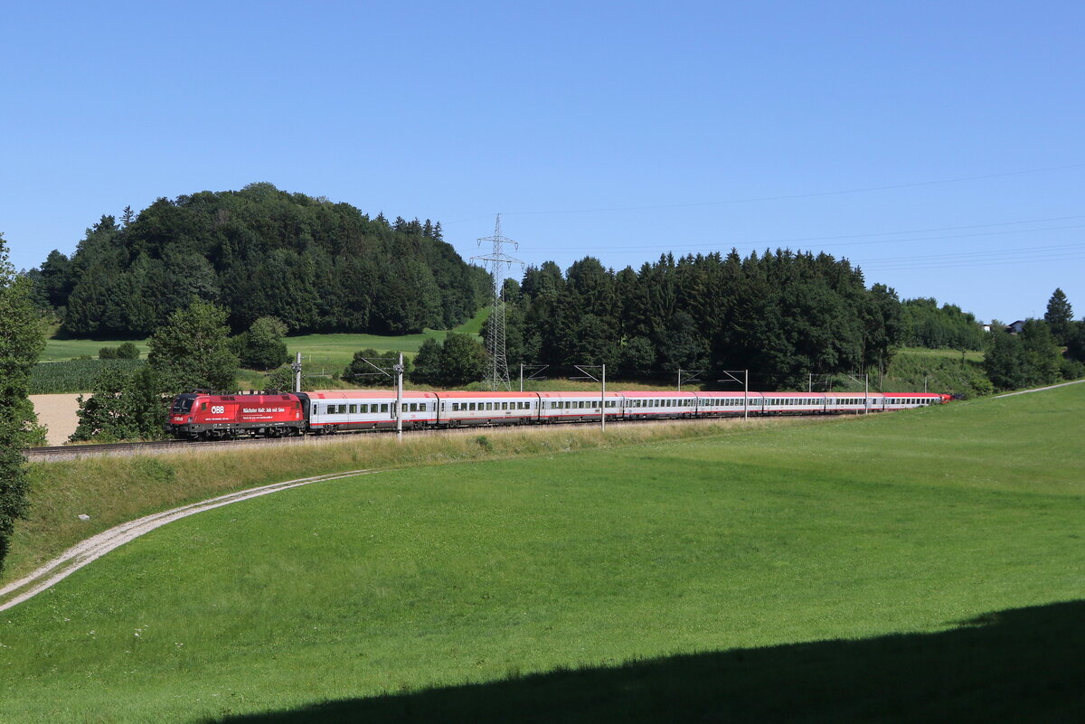 1116 199  Nchster Halt: Job mit Sinn  mit einem  EC  aus Salzburg kommend. Aufgenommen am 19. Juli 2025 bei Vachendorf im Chiemgau.