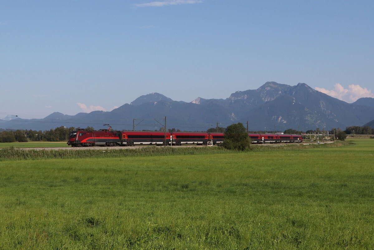 1116 215 war am 15. Juli 2024 bei Weisham in Richtung Mnchen unterwegs.