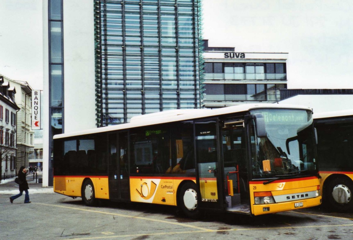 (124'431) - CarPostal Ouest - Nr. 29/JU 21'773 - Setra am 15. Februar 2010 beim Bahnhof Delmont