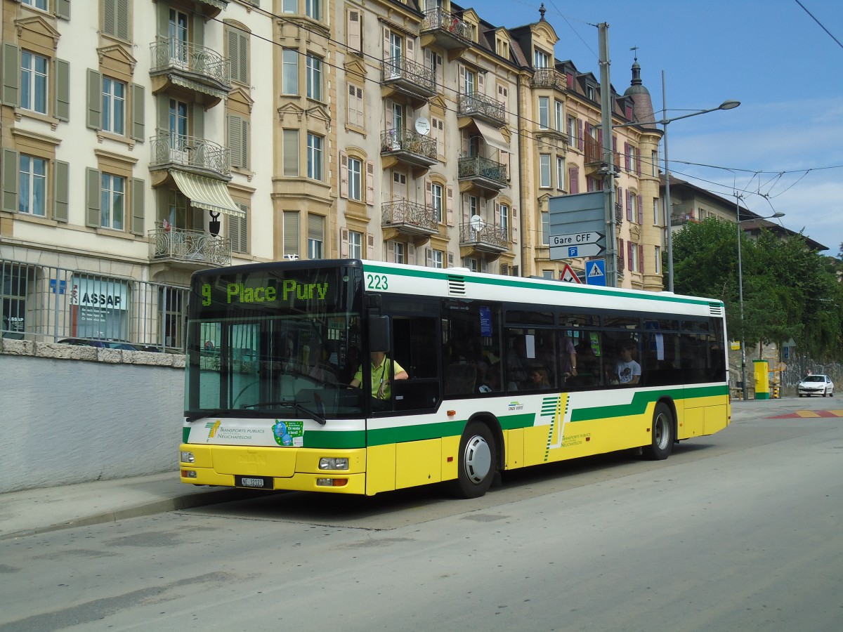 (129'579) - TN Neuchtel - Nr. 223/NE 32'123 - MAN am 6. September 2010 beim Bahnhof Neuchtel