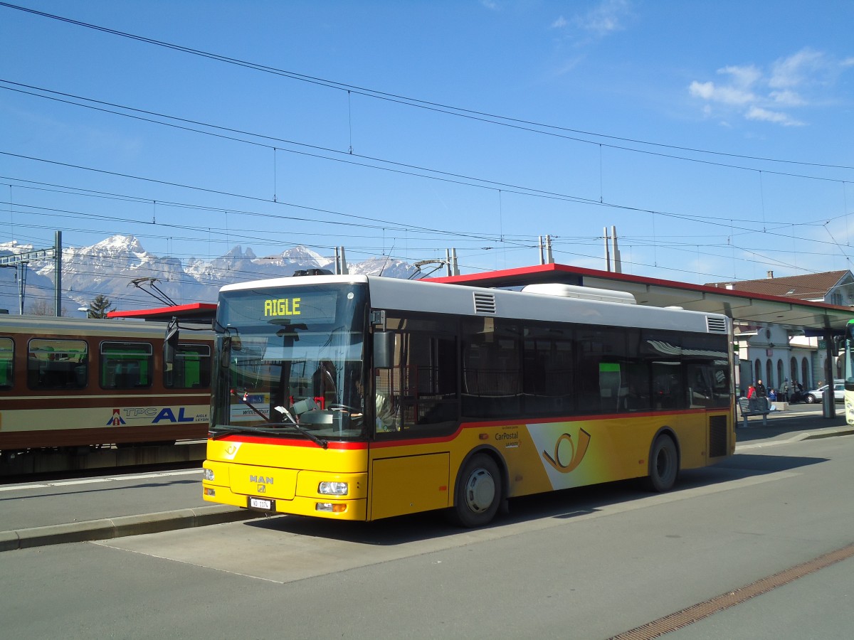 (132'615) - TPC Aigle - VD 1174 - MAN/Gppel am 19. Februar 2011 beim Bahnhof Aigle