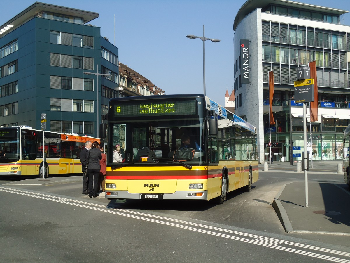 (132'767) - STI Thun - Nr. 91/BE 572'091 - MAN am 8. Mrz 2011 beim Bahnhof Thun