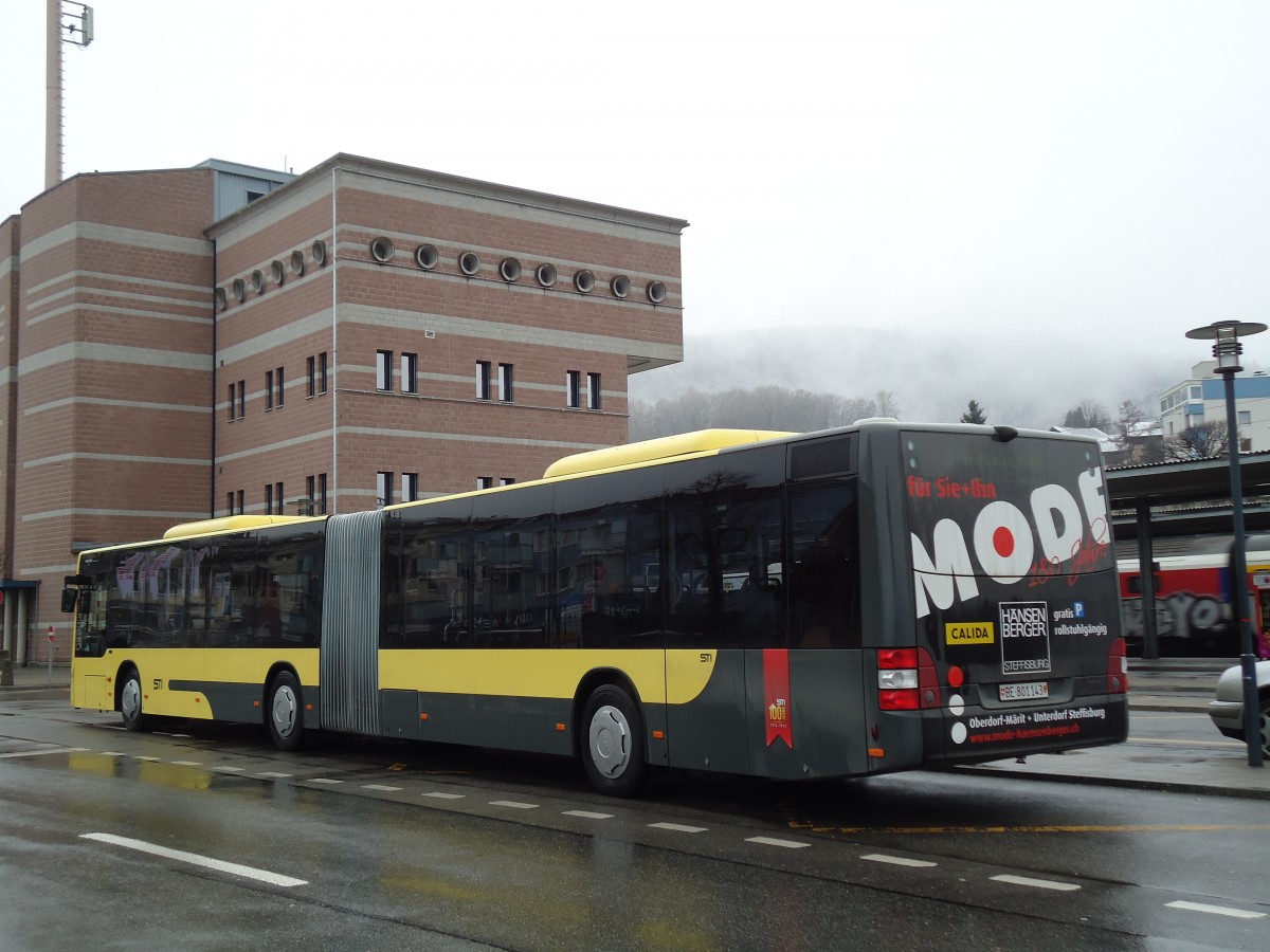 (143'504) - STI Thun - Nr. 143/BE 801'143 - MAN am 18. Mrz 2013 beim Bahnhof Spiez