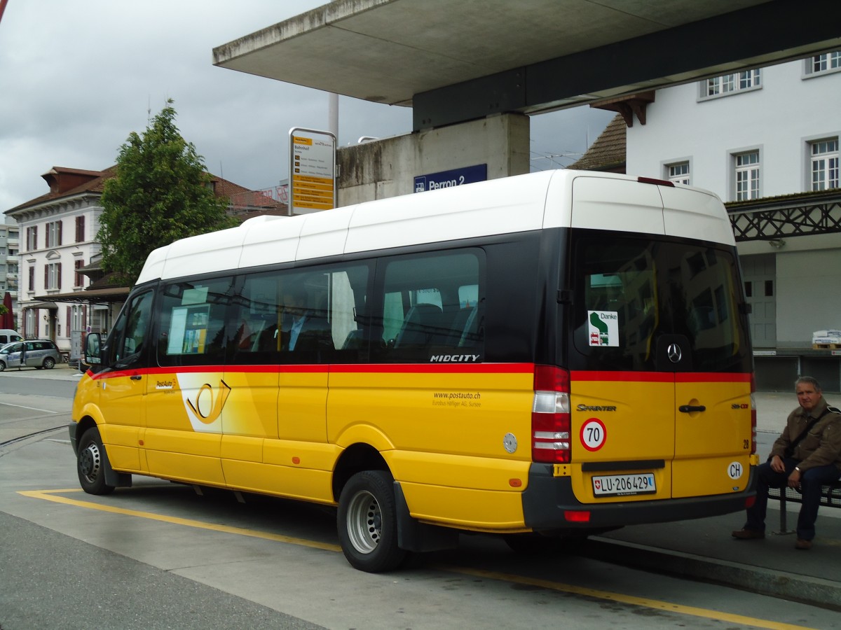 (144'921) - Hfliger, Sursee - Nr. 28/LU 206'429 - Mercedes am 10. Juni 2013 beim Bahnhof Sursee