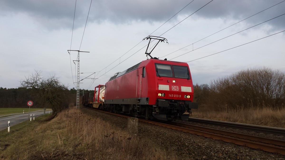 145 013-6 mit G�terzug von Rostock-Seehafen nach Hamburg Billwerder bei kurz vor der Einfahrt im Bahnhof Bad Kleinen.27.02.2016