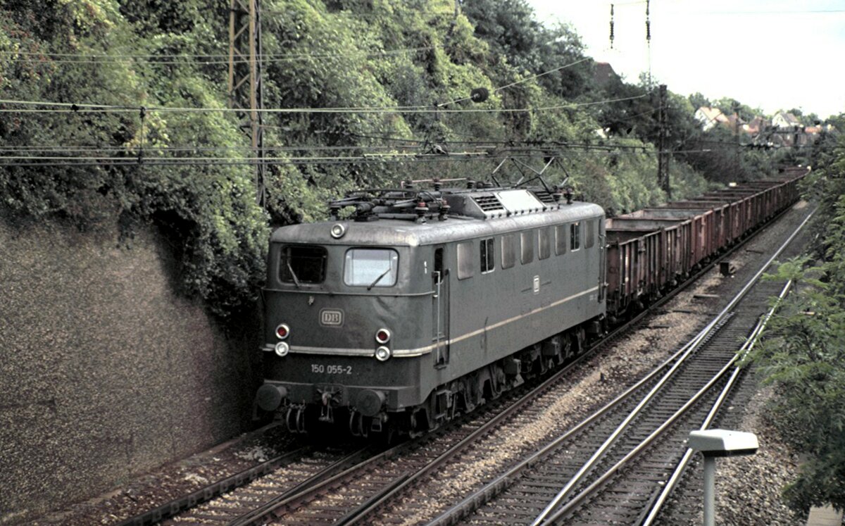 150 055-2 mit Leerzug offene Gterwagen Typ E in Ulm am 14.09.1987.