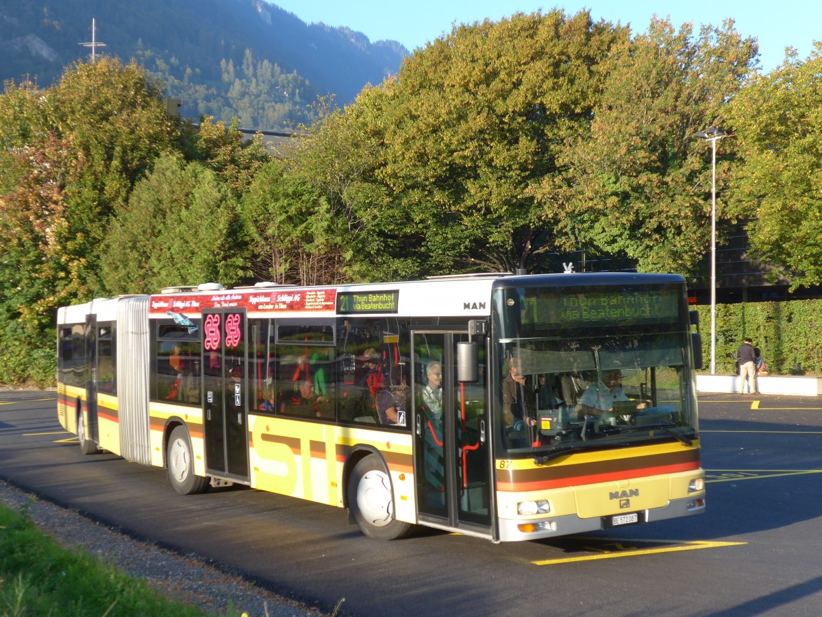 (155'360) - STI Thun - Nr. 87/BE 572'087 - MAN am 23. September 2014 beim Bahnhof Interlaken West