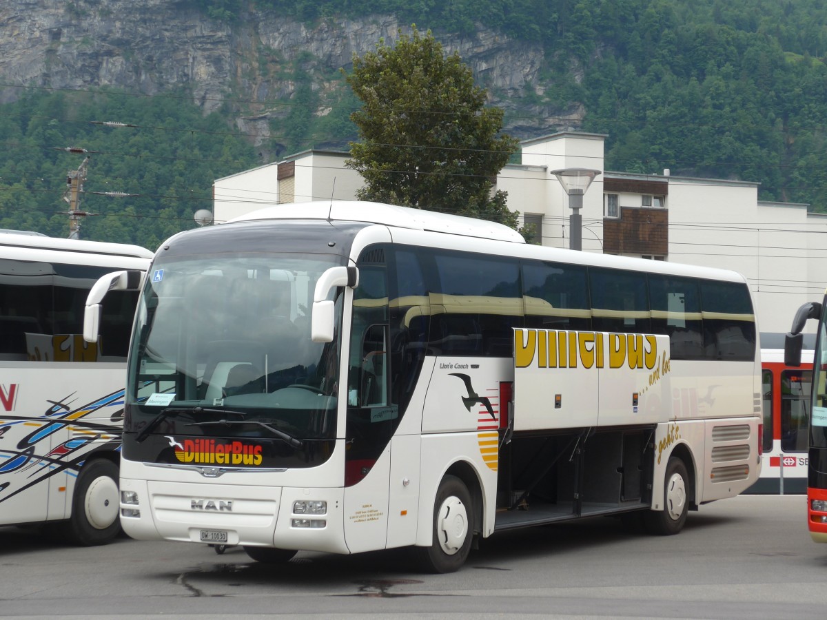 (161'994) - Dillier, Sarnen - OW 10'030 - MAN am 8. Juni 2015 beim Bahnhof Meiringen