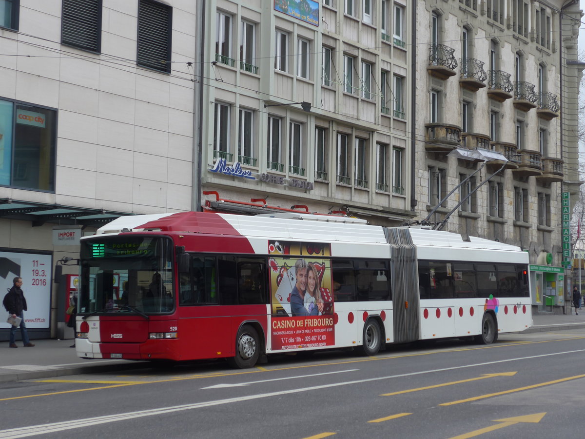 (169'227) - TPF Fribourg - Nr. 520/FR 300'435 - MAN/Hess Gelenkduobus am 13. Mrz 2016 beim Bahnhof Fribourg