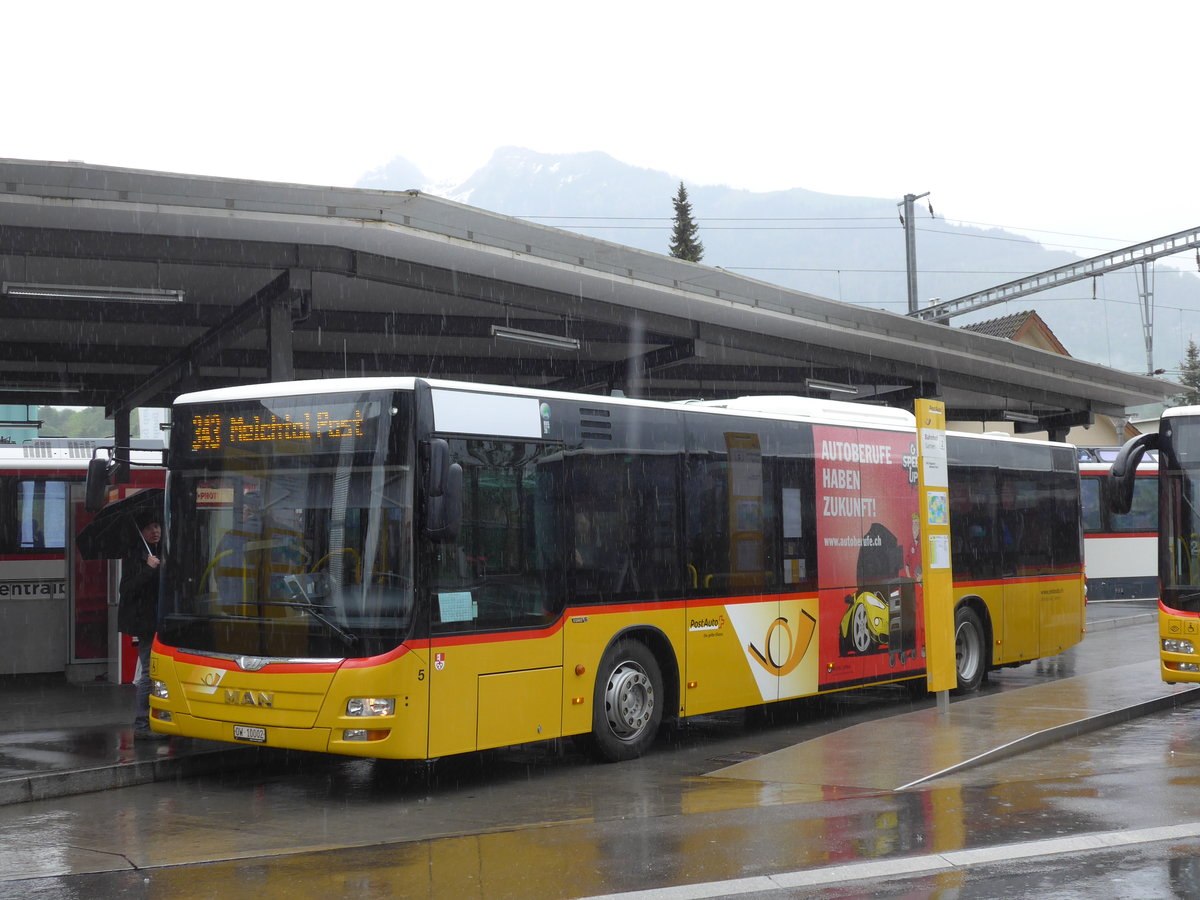 (170'548) - Dillier, Sarnen - Nr. 5/OW 10'002 - MAN am 14. Mai 2016 beim Bahnhof Sarnen