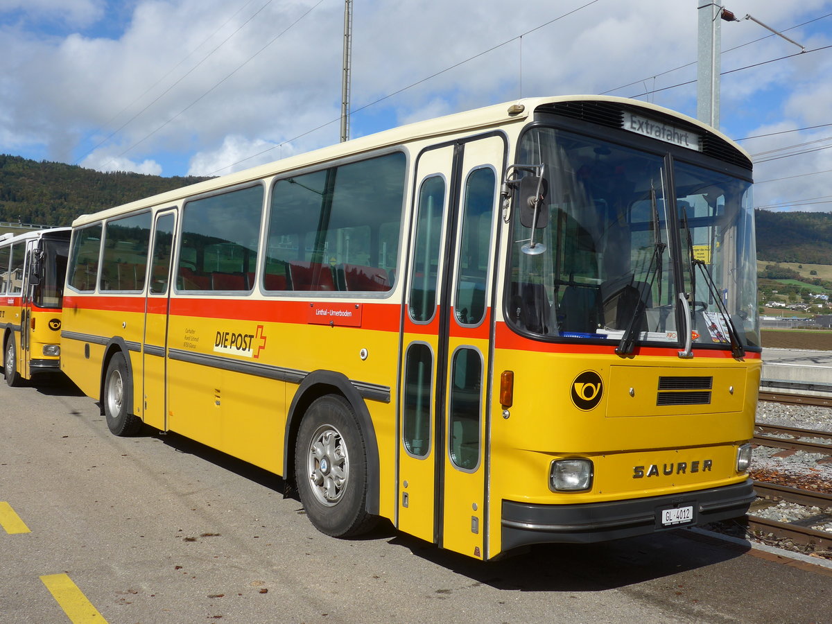 (175'382) - Schmid, Glarus - GL 4012 - Saurer/Tscher (ex Mosimann, Aesch; ex Erne, Full; ex P 24'257) am 2. Oktober 2016 beim Bahnhof Glovelier