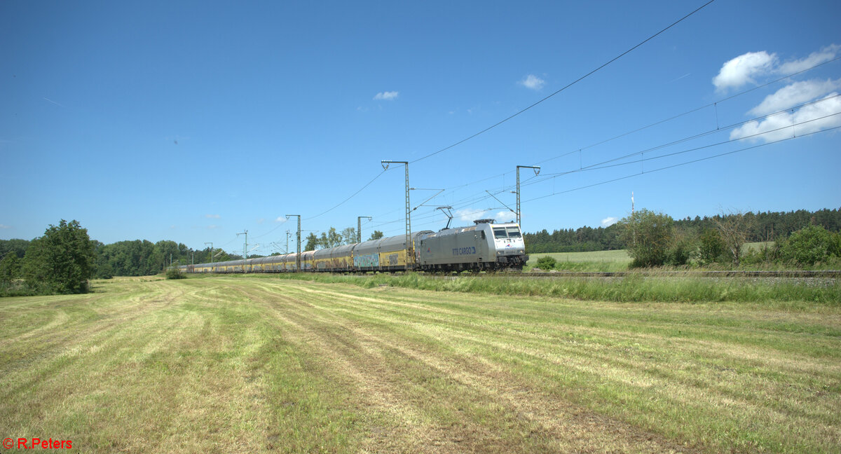 185 539-4 zieht bei Oberdachstetten mit einem ARS Altmann Zug in Richtung S�den. 08.06.24