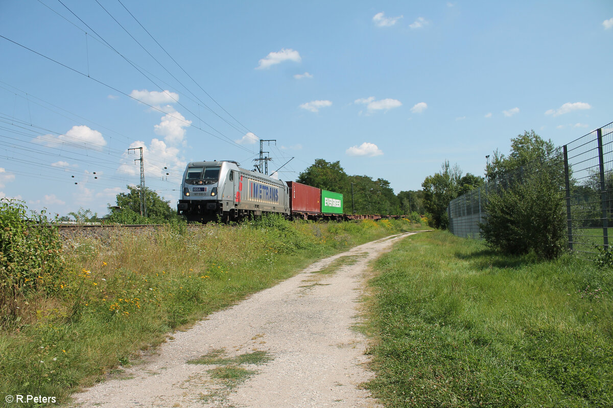 187 510-3 durchfährt die Treuchtlinger Kurve mit einem Containerzug in Nürnberg Hohe Marter. 13.08.24