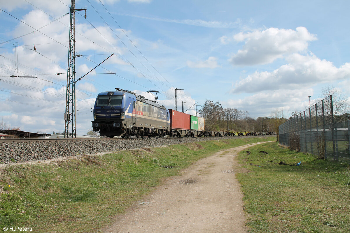 193 565-9  Evolution  mit fast leeren Containerzug in der Treuchtlinger Kurve in N�rnberg Hohe Marter. 25.03.24