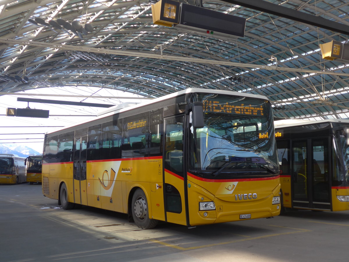 (201'230) - PostAuto Bern - BE 474'688 - Iveco am 19. Januar 2019 in Chur, Postautostation