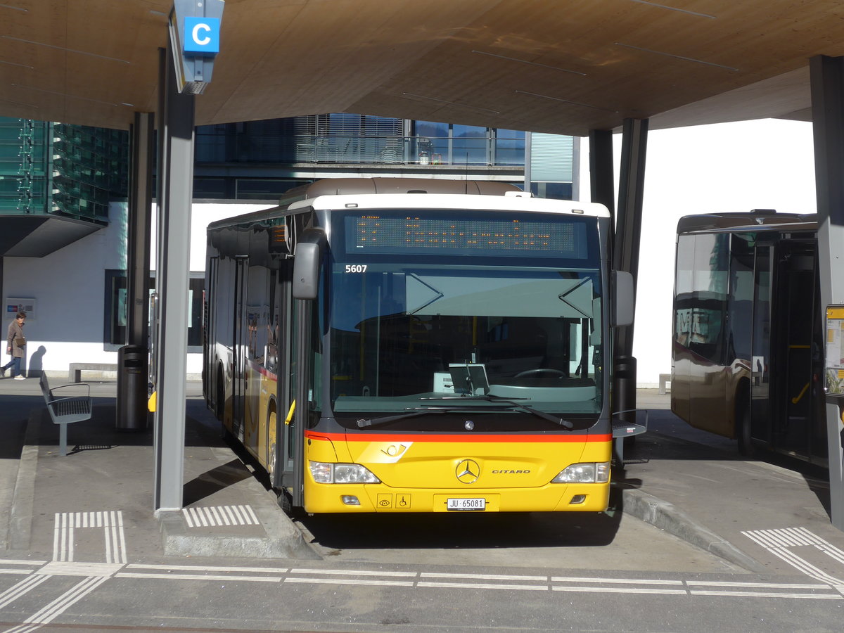 (201'602) - CarPostal Ouest JU 65'081 - Mercedes (ex Nr. 14) am 16. Februar 2019 beim Bahnhof Delmont