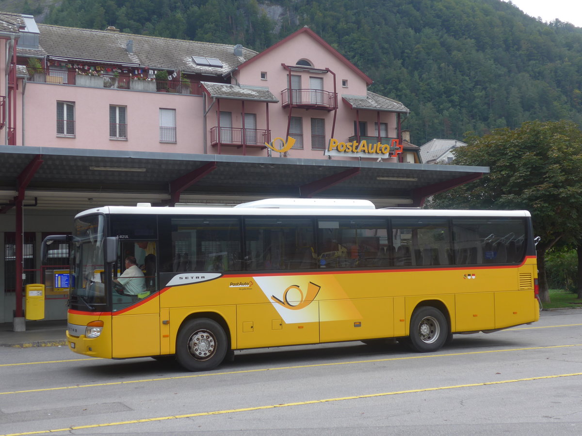 (209'175) - PostAuto Bern - BE 401'364 - Setra (ex AVG Meiringen Nr. 64) am 1. September 2019 in Meiringen, Postautostation