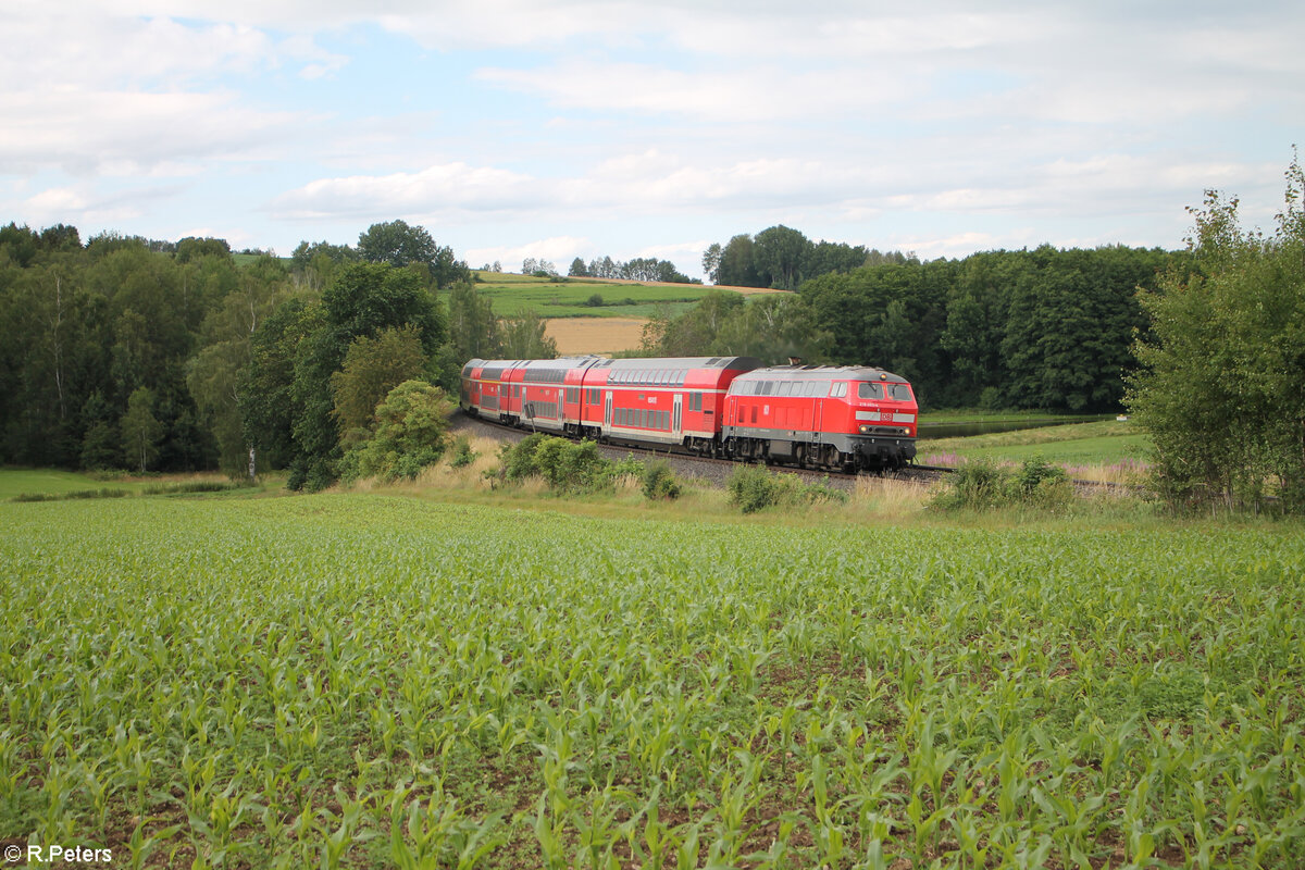 218 403-1 zieht als RE2 RE4865 Hof - München bei Lengenfeld. 07.07.24