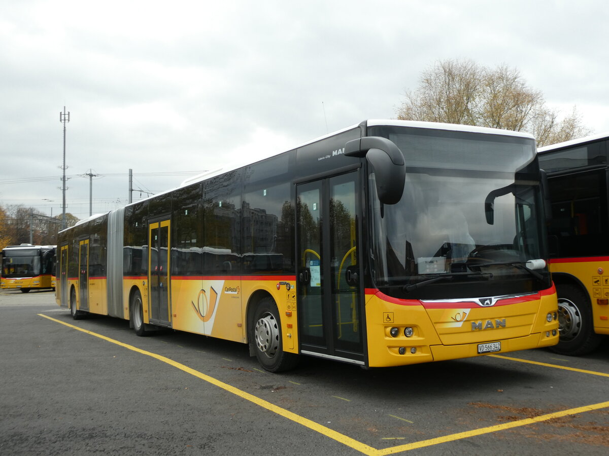 (230'670) - CarPostal Ouest - VD 566'342 - MAN am 13. November 2021 in Yverdon, Garage