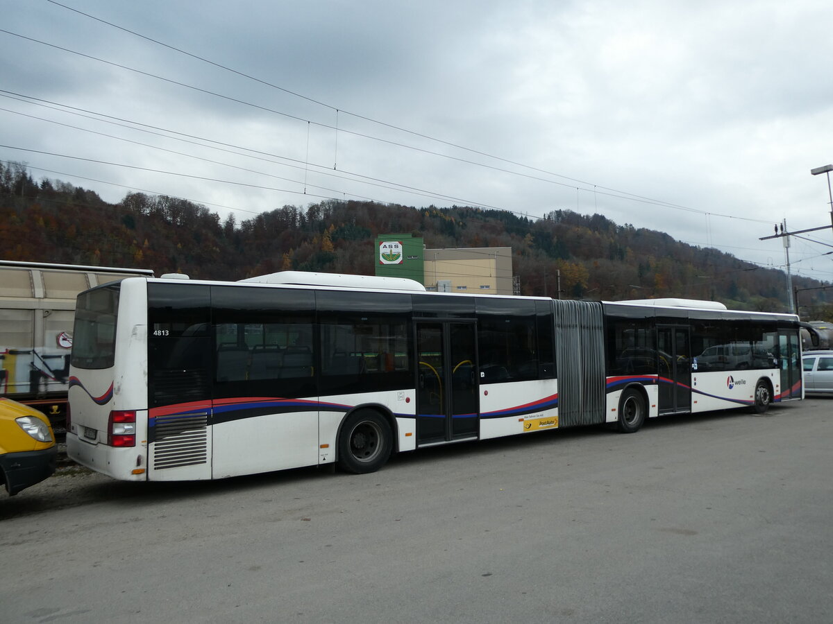 (230'701) - PostAuto Nordschweiz - NE 165'371 - MAN (ex AG 271'181) am 13. November 2021 beim Bahnhof Moudon (Einsatz CarPostal)