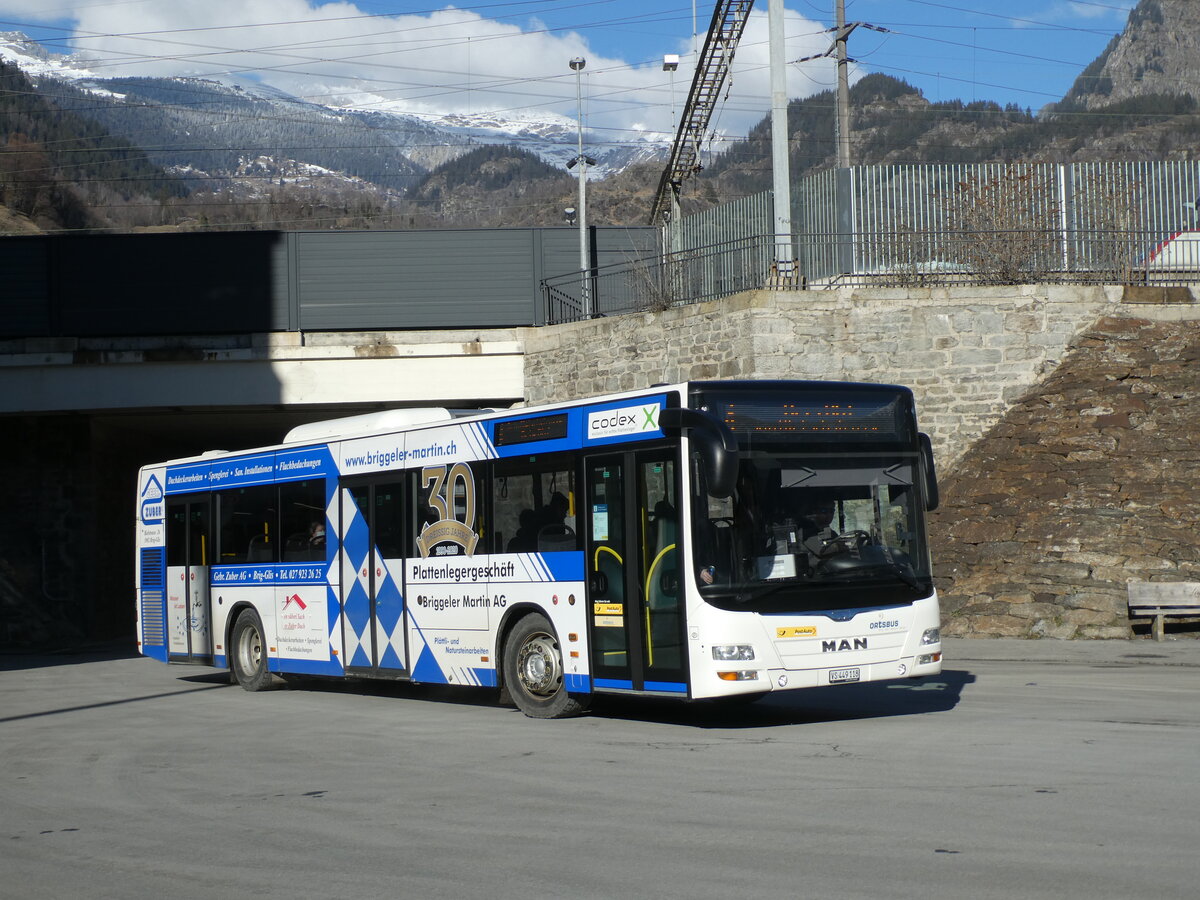 (232'238) - PostAuto Wallis - VS 449'118 - MAN am 21. Januar 2022 beim Bahnhof Brig