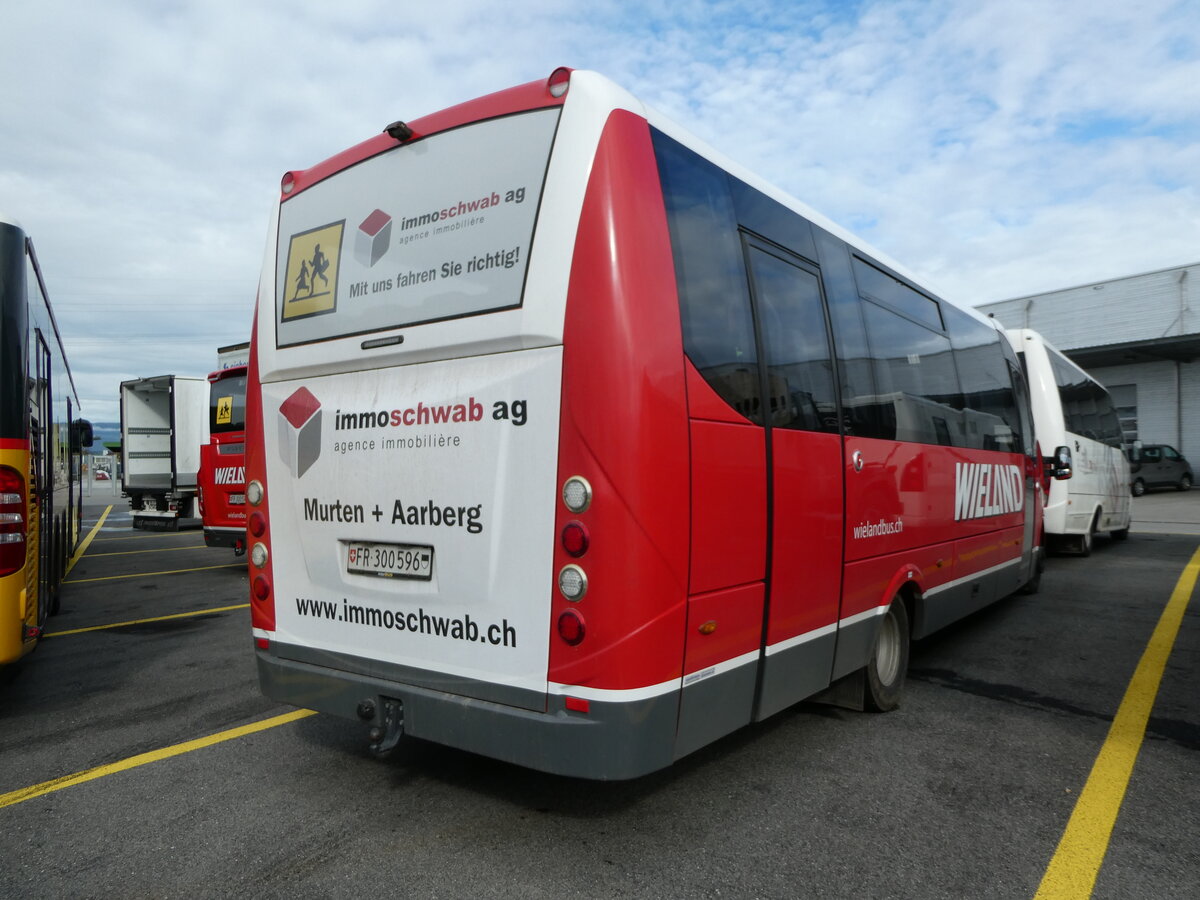 (241'384) - Wieland, Murten - Nr. 96/FR 300'596 - Iveco/Rosero am 15. Oktober 2022 in Kerzers, Interbus