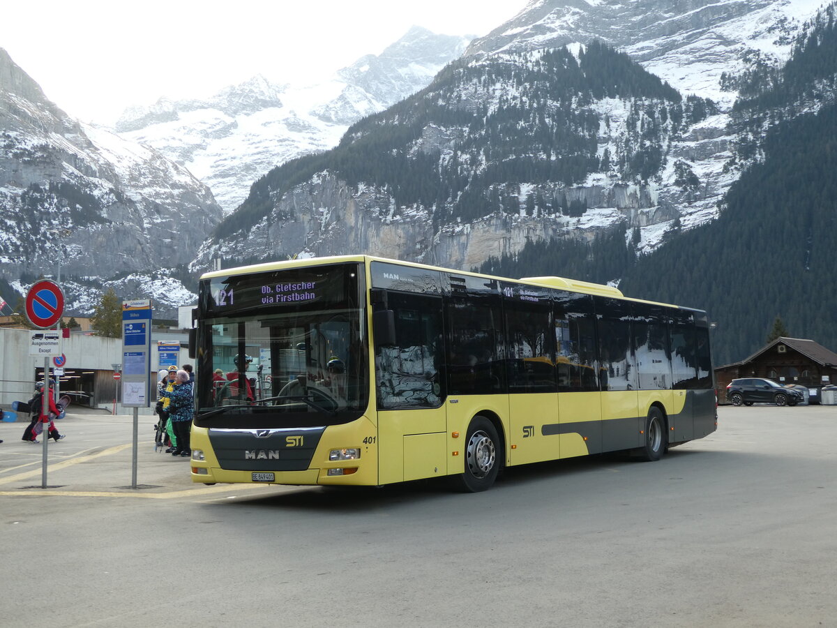 (246'211) - STI Thun - Nr. 401/BE 849'401 - MAN am 17. Februar 2023 beim Bahnhof Grindelwald (Einsatz Grindelwaldbus)