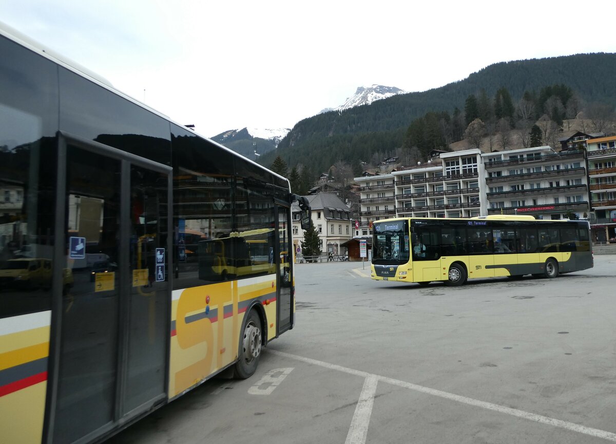 (246'232) - STI Thun - Nr. 401/BE 849'401 - MAN am 17. Februar 2023 beim Bahnhof Grindelwald (Einsatz Grindelwaldbus)