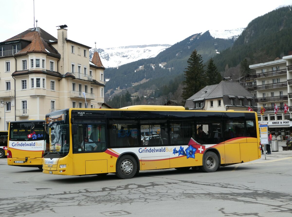 (246'242) - Grindelwaldbus, Grindelwald - Nr. 19/BE 363'305 - MAN am 17. Februar 2023 beim Bahnhof Grindelwald