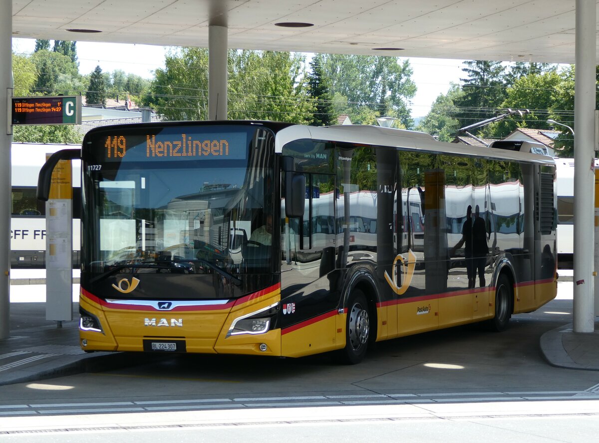 (252'435) - PostAuto Nordschweiz - BL 224'307/PID 11'727 - MAN am 7. Juli 2023 beim Bahnhof Laufen