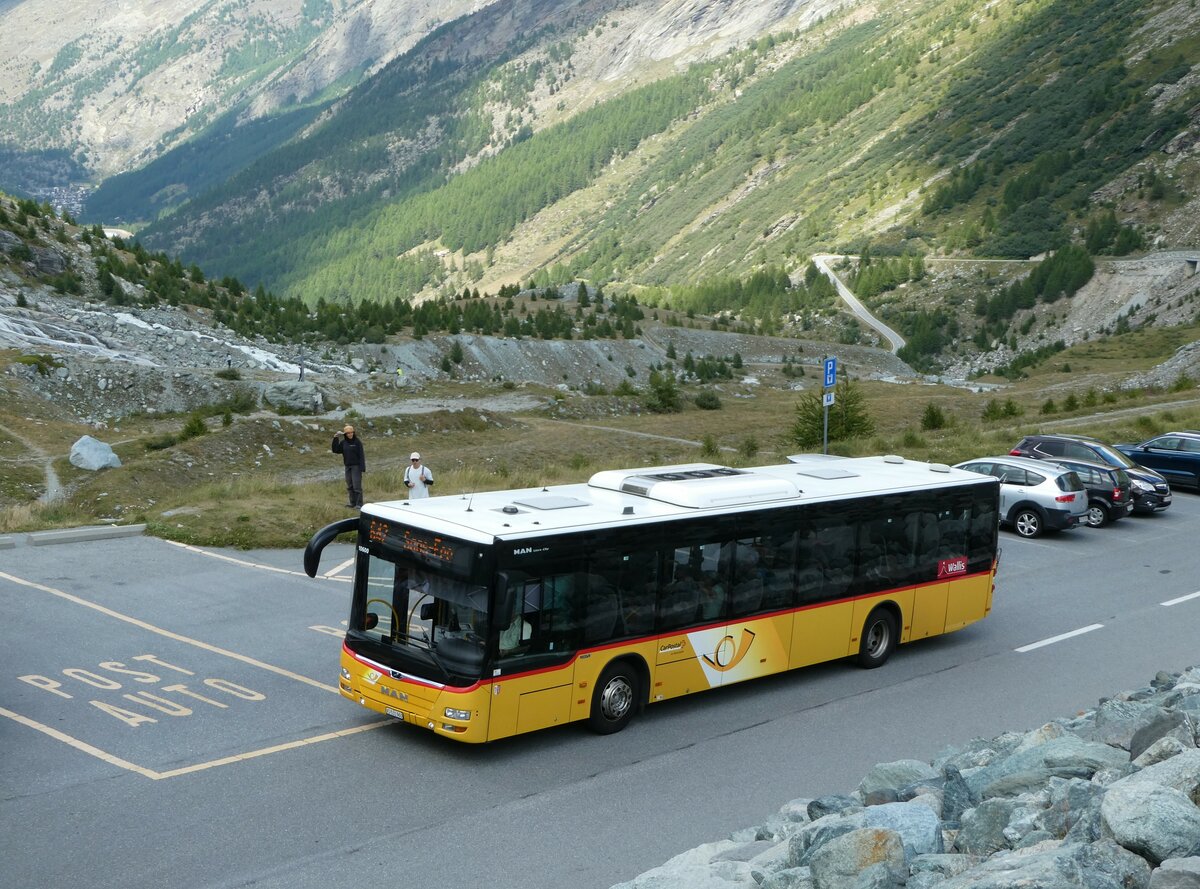 (253'854) - PostAuto Wallis - VS 531'960/PID 10'600 - MAN (ex CarPostal Ouest) am 15. August 2023 beim Mattmark