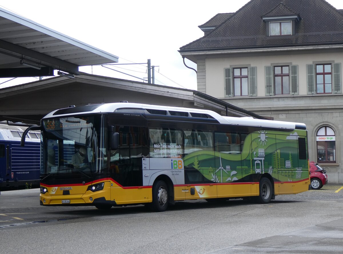 (260'765) - Voegtlin-Meyer, Brugg - AG 381'644/PID 11'611 - eScania am 28. Mrz 2024 beim Bahnhof Brugg