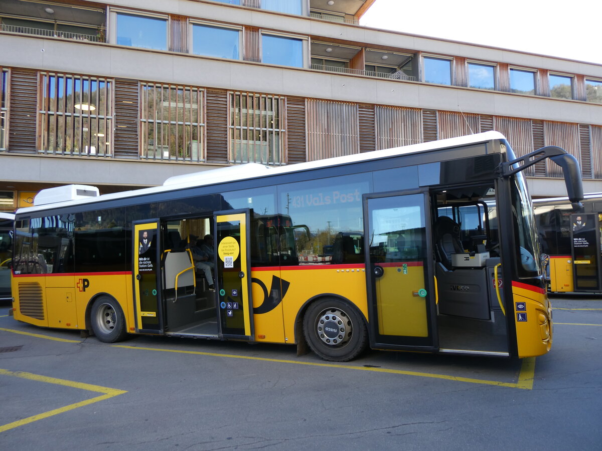 (268'832) - PostAuto Graub�nden - GR 102'306/PID 12'012 - Iveco (ex Nr. 6) am 29. Oktober 2024 beim Bahnhof Ilanz