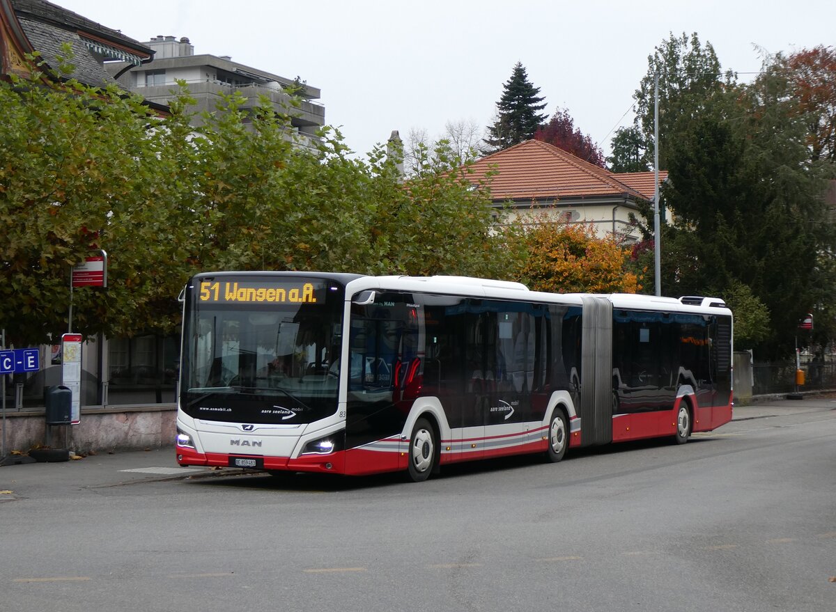 (268'860) - ASm Langenthal - Nr. 83/BE 859'483 - MAN am 31. Oktober 2024 beim Bahnhof Herzogenbuchsee