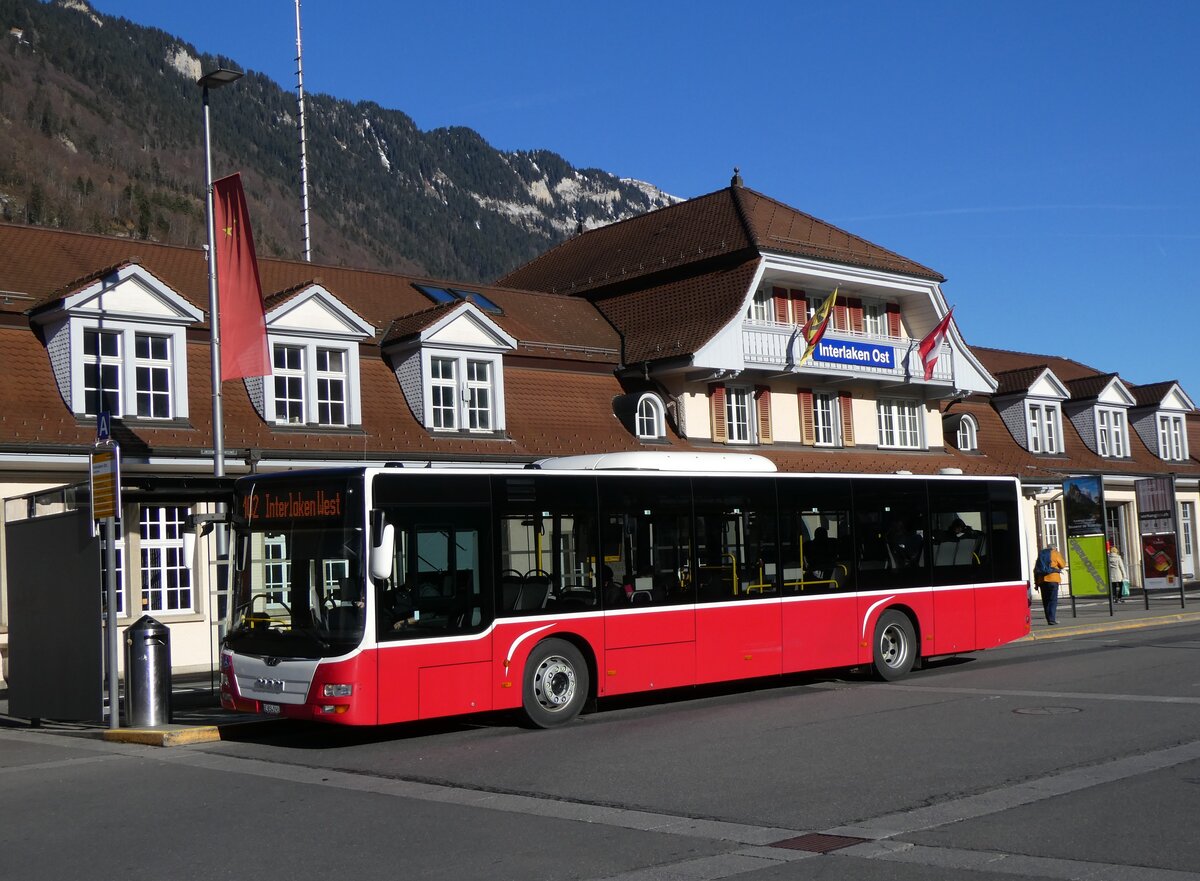 (269'911) - PostAuto Bern - BE 654'090/PID 12'339 - MAN (ex Dr. Richard, A-Wien Nr. 1419) am 16. Dezember 2024 beim Bahnhof Interlaken Ost