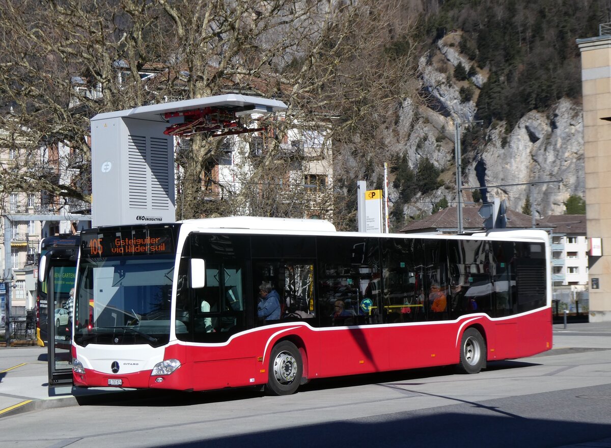 (273'085) - PostAuto Bern - BE 707'874/PID 12'319 - MAN (ex Wiener Linien, A-Wien Nr. 8163) am 20. Mrz 2025 beim Bahnhof Interlaken West