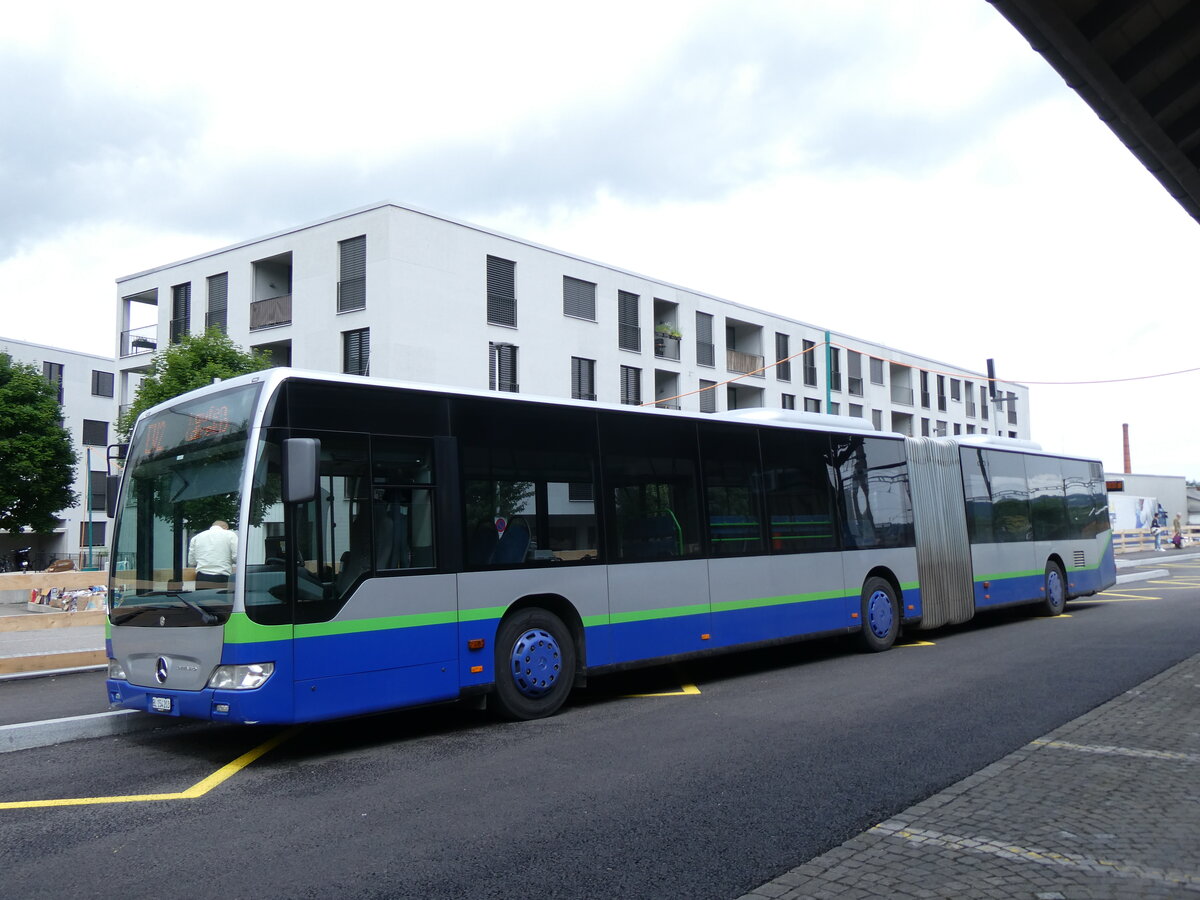 (276'222) - PostAuto Nordschweiz - BL 154'203/PID 12'421  Mercedes (ex TPL Lugano Nr. 405) am 3. Juni 2025 beim Bahnhof Aesch