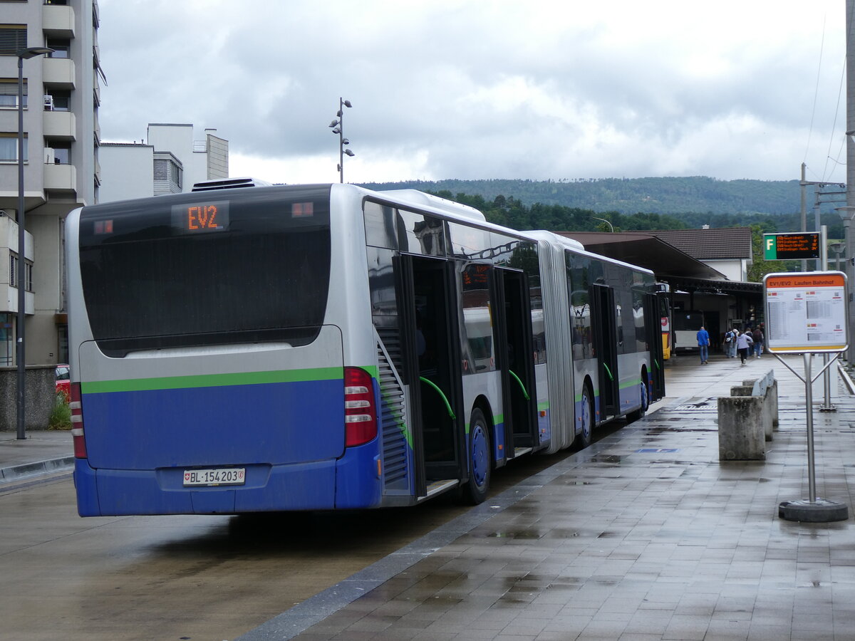 (276'240) - PostAuto Nordschweiz - BL 154'203/PID 12'421 - Mercedes (ex TPL Lugano Nr. 405) am 3. Juni 2025 beim Bahnhof Laufen