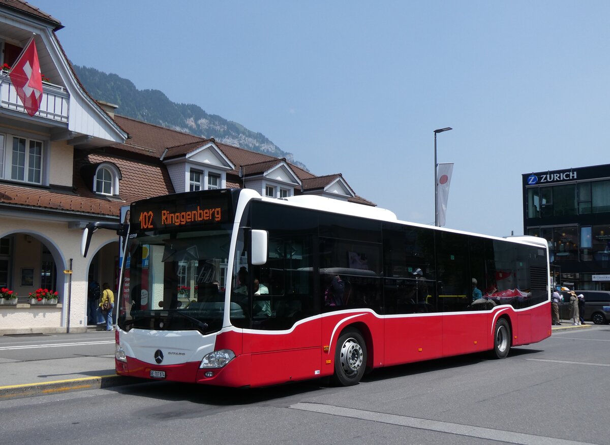 (276'544) - PostAuto Bern - BE 707'874/PID 12'319 - Mercedes (ex Wiener Linien, A-Wien Nr. 8163) am 9. Juni 2025 beim Bahnhof Interlaken Ost