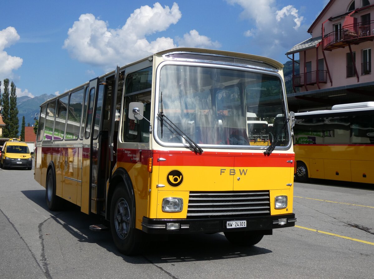 (277'378) - Lambach, Gommiswald - NW 24'301 - FBW/Eggli (ex Tanner+Lambach, Reigoldswil; ex Lambach, Rieden; ex Meier, Grt; ex AVG Grindelwald Nr. 13; ex P 24'182) am 1. Juli 2025 beim Bahnhof Meiringen