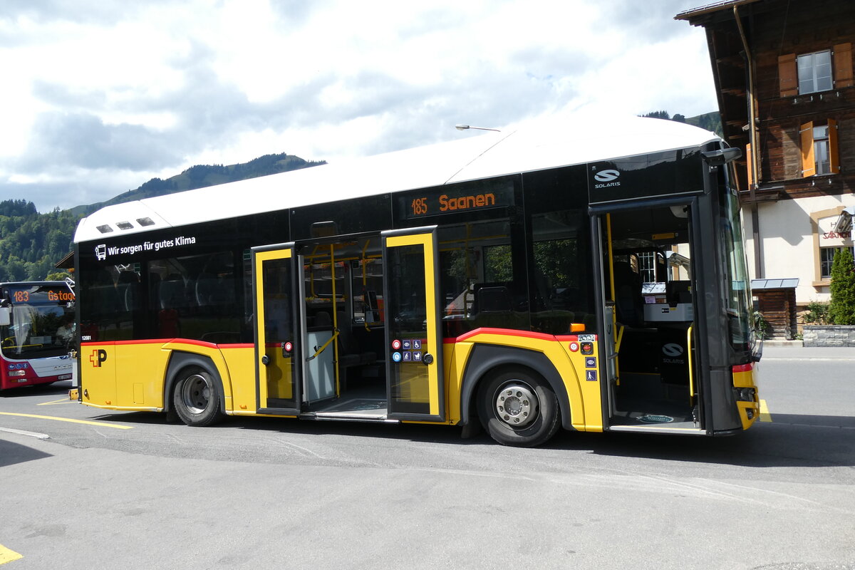 (278'568) - PostAuto Graubnden - GR 162'991/PID 12'081 - eSolaris am 5. August 2025 beim Bahnhof Saanen