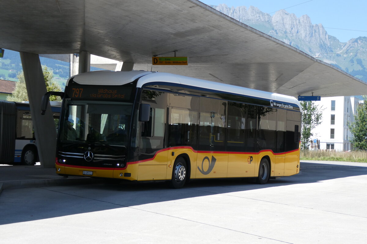 (278'650) - PostAuto Ostschweiz - SG 499'211/PID 12'131 - eMercedes am 8. August 2025 beim Bahnhof Buchs