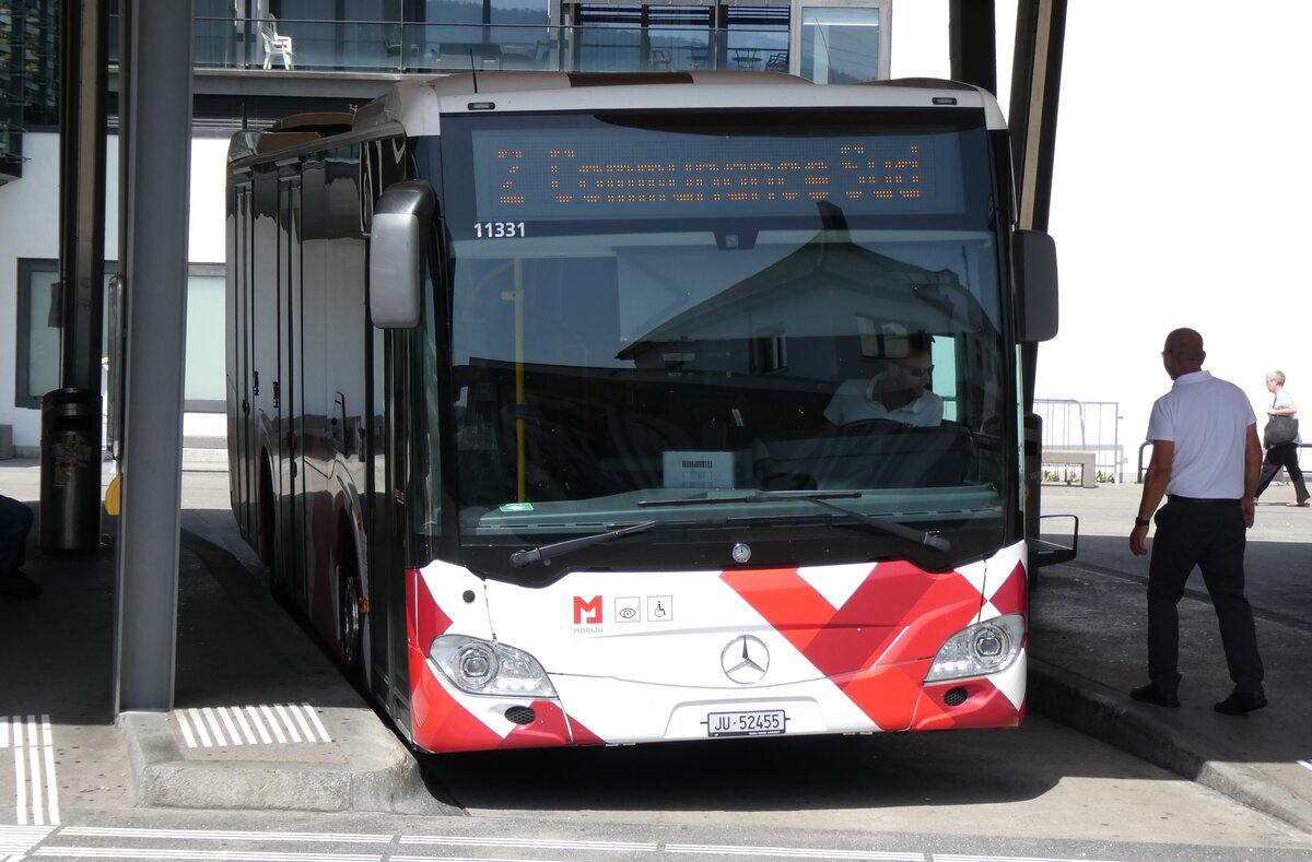 (278'832) - CarPostal Ouest - JU 52'455/PID 11'331 - Mercedes am 14. August 2025 beim Bahnhof Delmont
