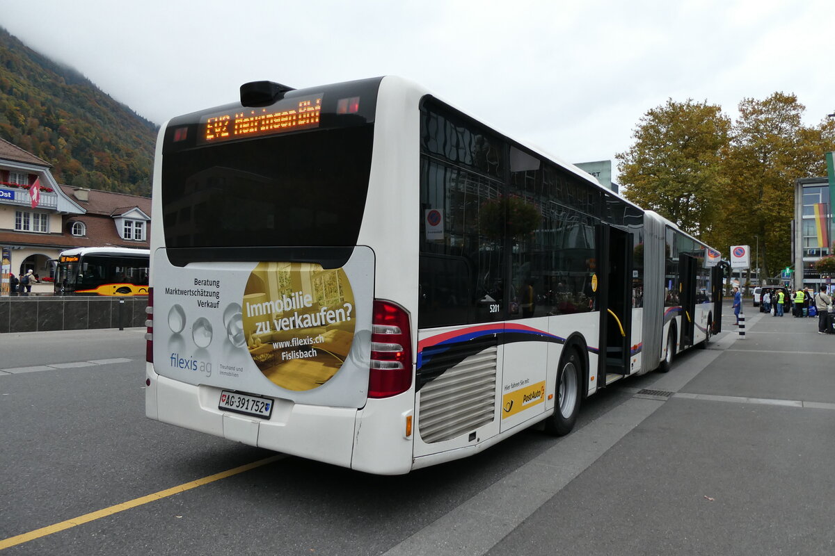 (281'509) - PostAuto Nordschweiz - AG 391'752/PID 5201 - Mercedes (ex Wicki, Zufikon) am 14. Oktober 2025 beim Bahnhof Interlaken Ost