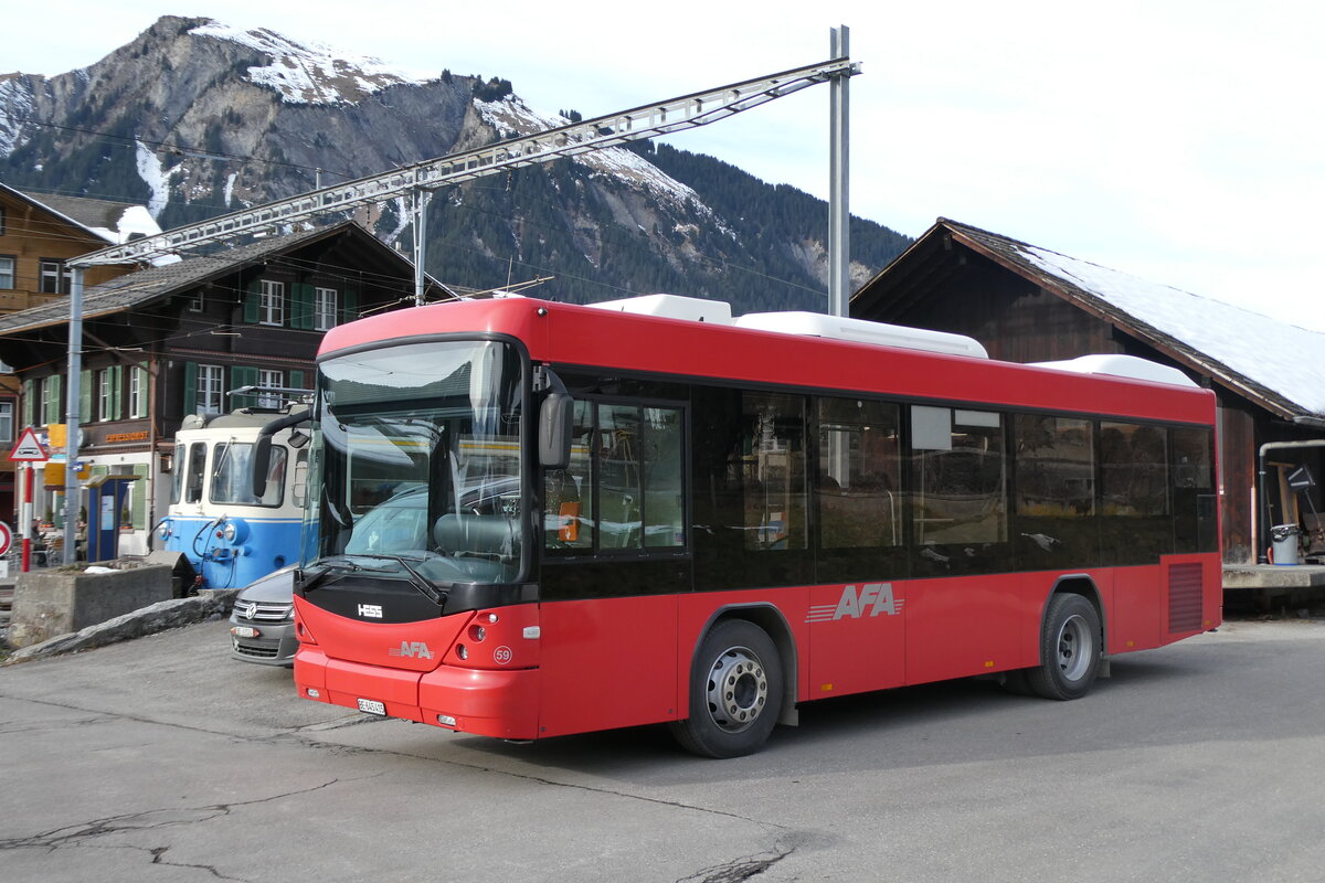 (283'204) - AFA Adelboden- Nr. 59/BE 645'415 - Scania/Hess am 15. Dezember 2025 beim Bahnhof Lenk