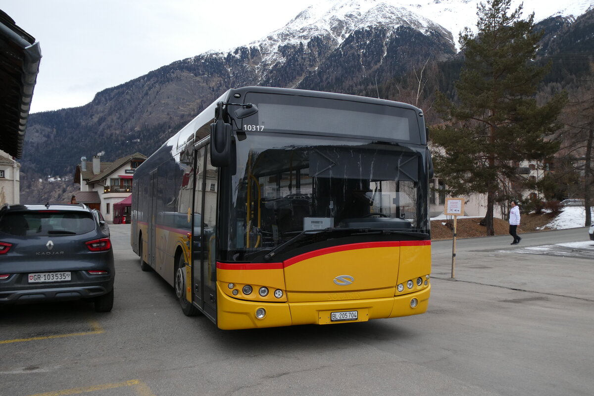 (284'868) - PostAuto Nordschweiz - BL 205'704/PID 10'317 - Solaris am 14. Februar 2026 beim Bahnhof Zernez
