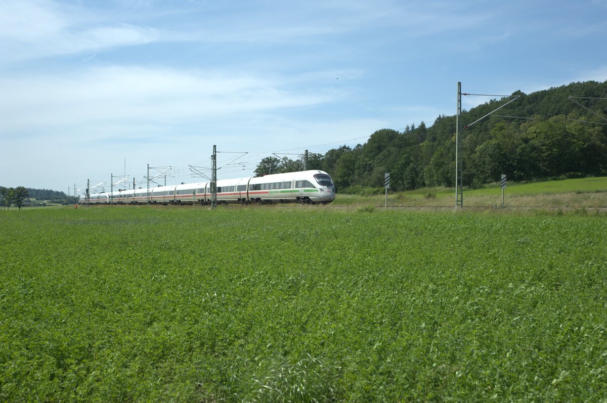 411 069  Tutzing  als ICE93 Hamburg - Wien bei Oberdachstetten. 08.06.24