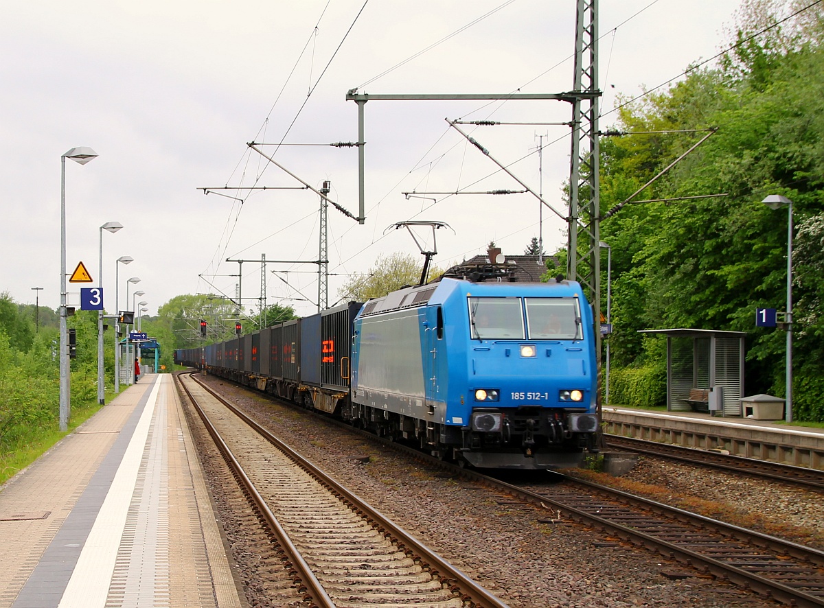 AlphaTrains/TXL 185 512-1 hat den BlackBox ThyssenKrupp Kohle Transport am Haken und rauscht damit durch Schleswig. 14.05.2014