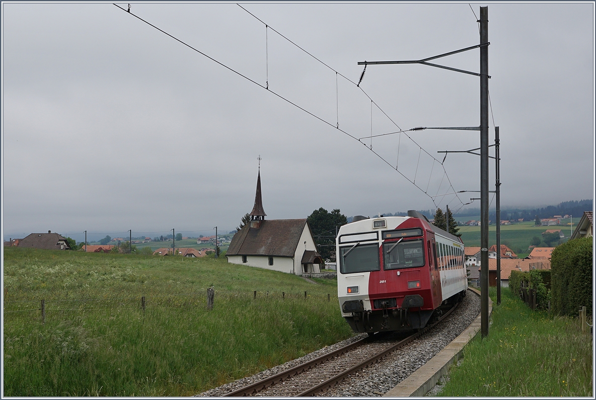 Am Schluss eines RE nach Bulle ist dieser TPF ABt 381 (Typ NPZ) eingereiht. 

12. Mai 2020